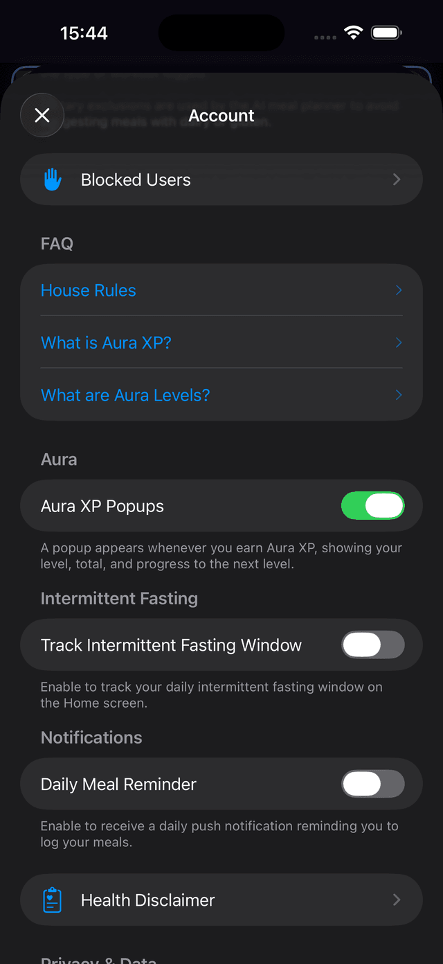 Account settings showing Blocked Users, FAQ section with House Rules, Aura XP, and Aura Levels links, Aura XP Popups toggle, Intermittent Fasting toggle, and Daily Meal Reminder toggle